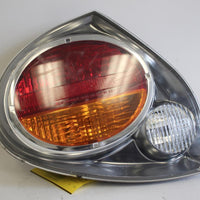 2002-2003 NISSAN MAXIMA DRIVER SIDE REAR TAIL LIGHT - BIGGSMOTORING.COM