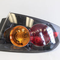 2004-2006 MAZDA 3 REAR PASSENGER SIDE TAIL LIGHT - BIGGSMOTORING.COM