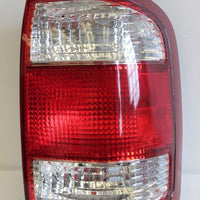 1999-2004 NISSAN PATHFINDER PASSENGER SIDE REAR TAIL LIGHT - BIGGSMOTORING.COM