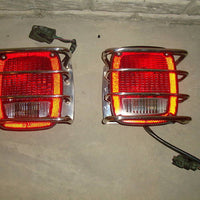 87-06 JEEP WRANGLER TAILLIGHTS W/ GUARD FREE CHROME GAS