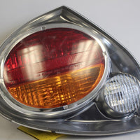 2002-2003 NISSAN MAXIMA DRIVER SIDE REAR TAIL LIGHT - BIGGSMOTORING.COM