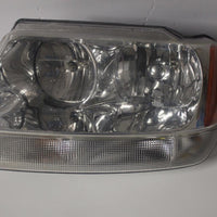 1999-2004 JEEP GRAND CHEROKEE FRONT DRIVER SIDE HEADLIGHT 27770 - BIGGSMOTORING.COM