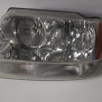 1999-2004 JEEP GRAND CHEROKEE FRONT DRIVER SIDE HEADLIGHT 27770 - BIGGSMOTORING.COM